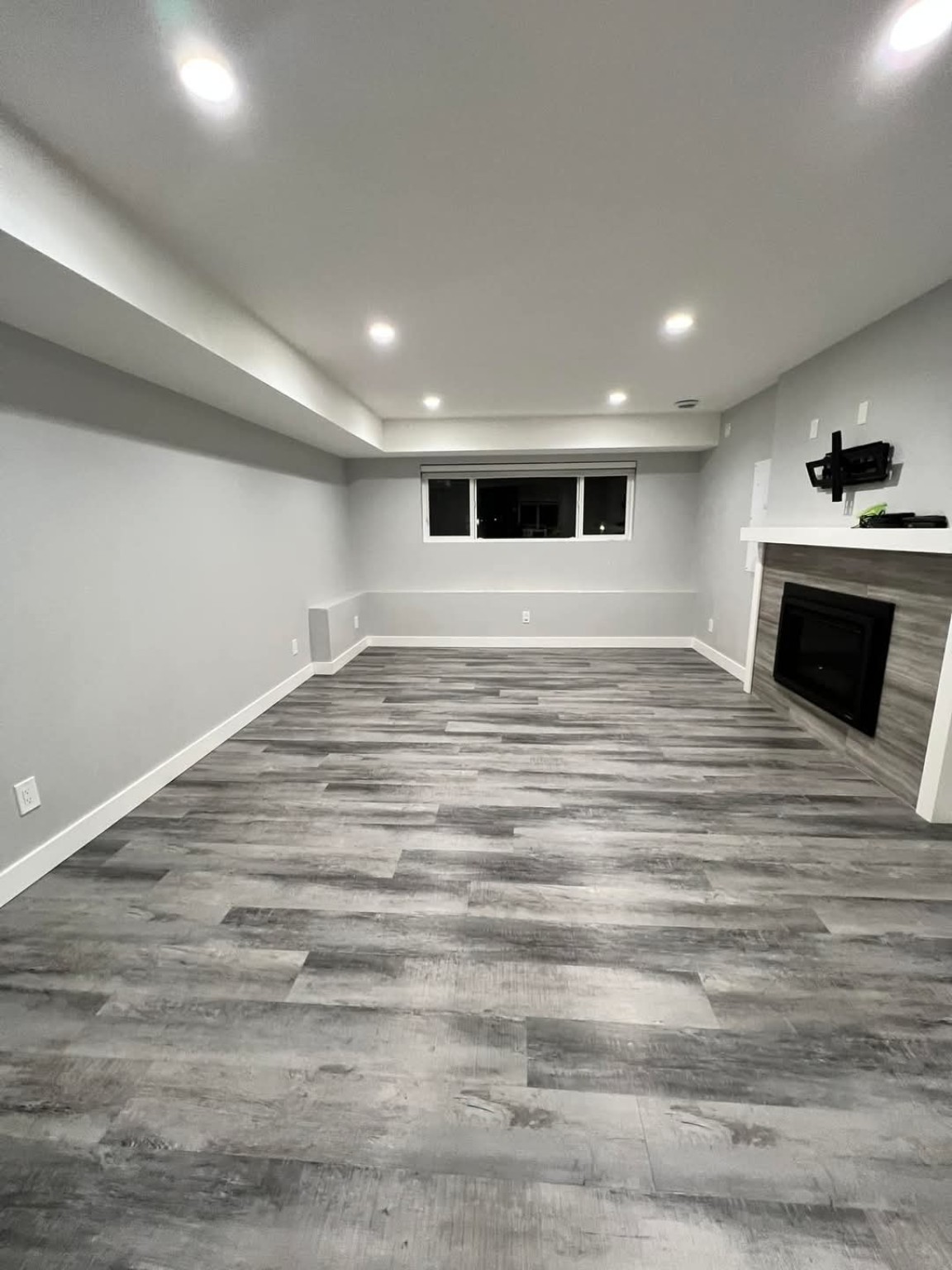 Finished basement with new pot lights and electrical work